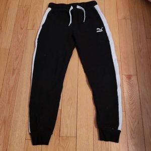 Boys black puma joggers with white stripe